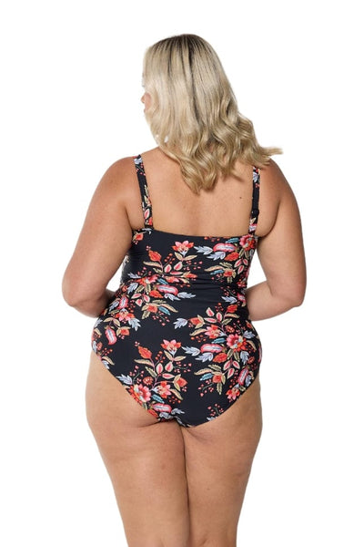 Back of model in studio wearing plus size one piece with removable straps in multi coloured floral Australia