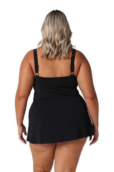 Model showing back of black floral swim dress