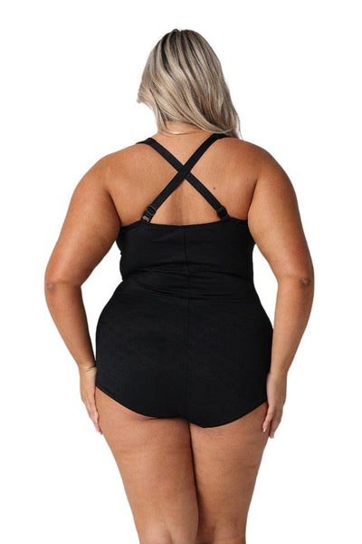 Model showing back of black retro women's one piece