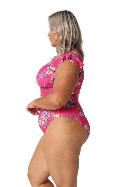 Model showing side of hot pink floral frill sleeve one piece