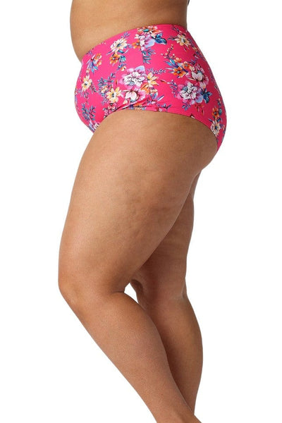 Model showing side of high waisted pink floral bikini bottoms