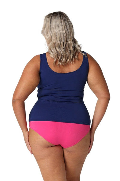 Back of model in studio showing off navy and pink chlorine resistant zip front tankini
