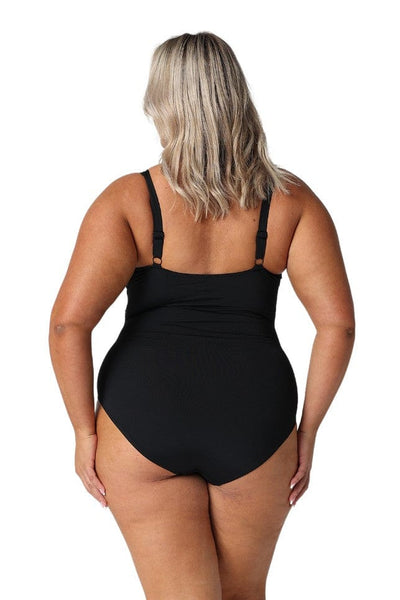 Back of model wearing curvy black high neck swimsuit with ruching and adjustable straps