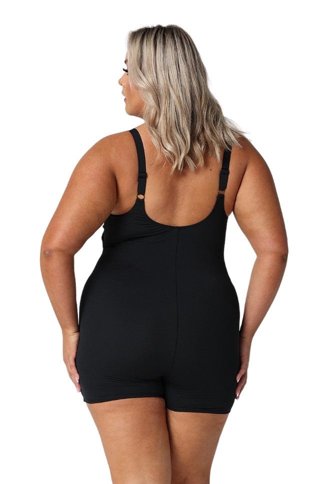 Back of  model in studio wearing plus size boyleg playsuit with scoop back and adjustable straps in chlorine resistant