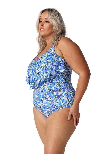 Side profile of model wearing floral bathing suit in blue and white watercolour floral for curvy body australia