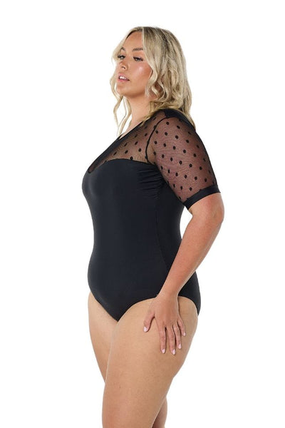 Blonde model wears heart shaped neckline with mesh polkadot