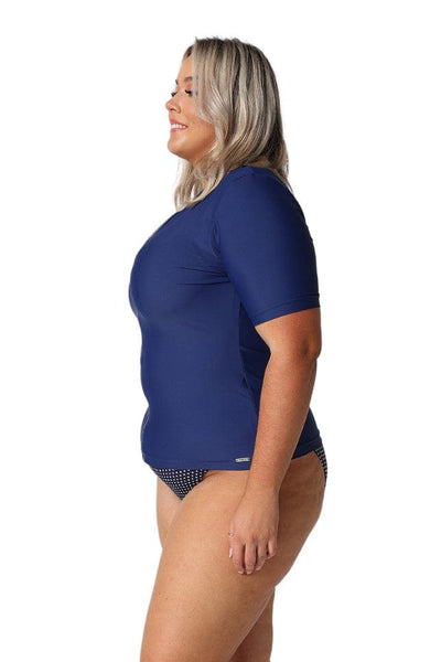 Blonde model showing side of navy short sleeve rash vest