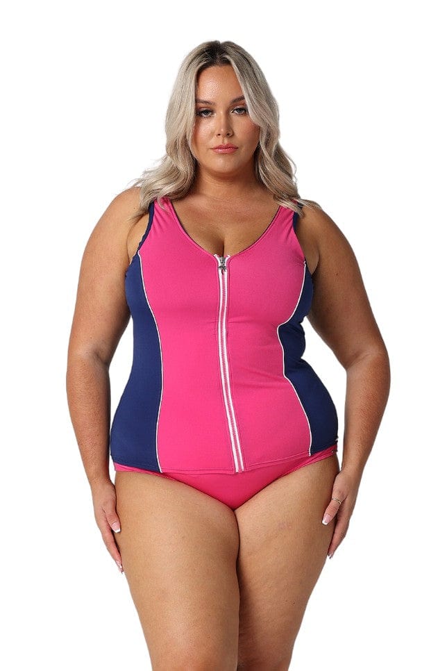 In studio image of blonde model wearing bright pink flattering tankini top with full zip front detail