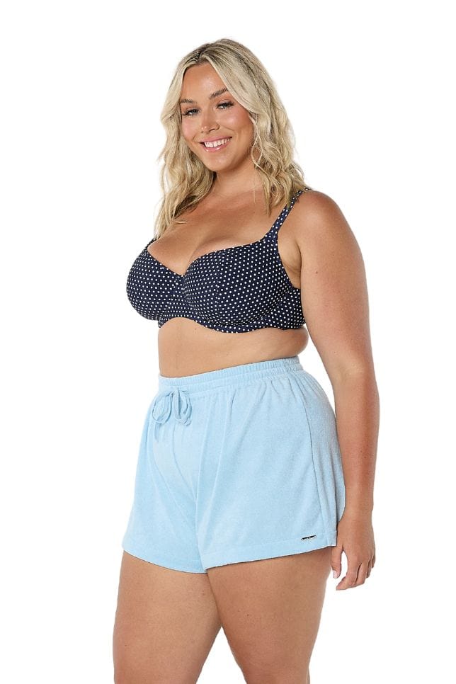 Model in studio wearing plus size powder blue terry towelling short with draw string detail