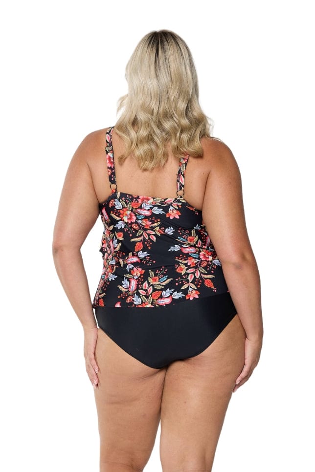 Back of model in studio wearing pink white red and black coloured tankini top in floral print with adjustable straps