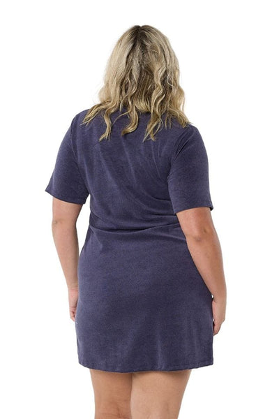 Back of model wearing plus size coverup dress in navy terry towelling