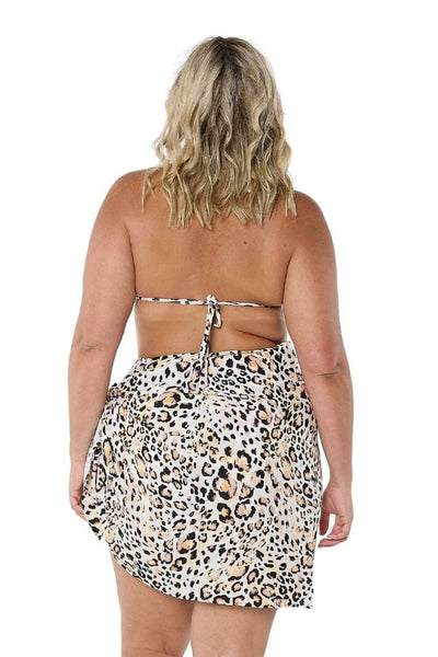 Back of model wearing high waisted wrap tie skirt for curve women in leopard print