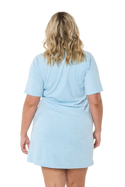 Plus size model wearing short terry towelling dress in powder blue terry towelling