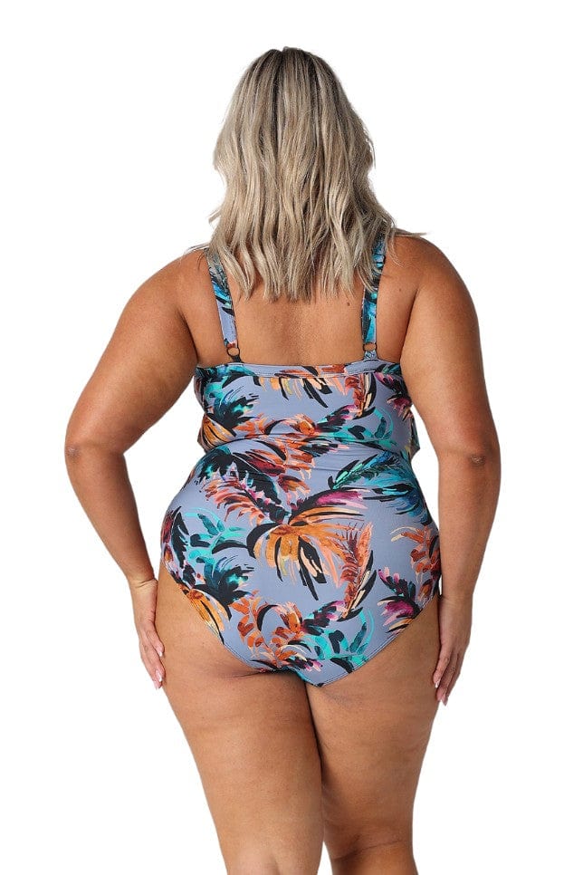 Back of model wearing flattering tiered one piece with adjustable straps for curve women