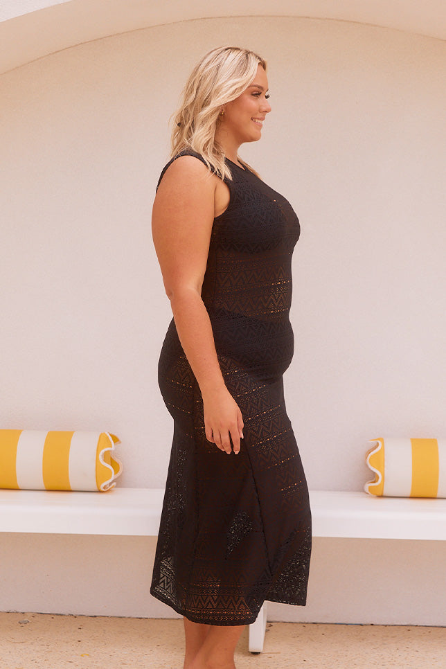 Model showing side of mesh maxi dress