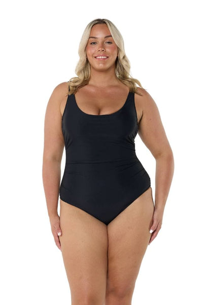 Blonde model wearing black scooped one piece