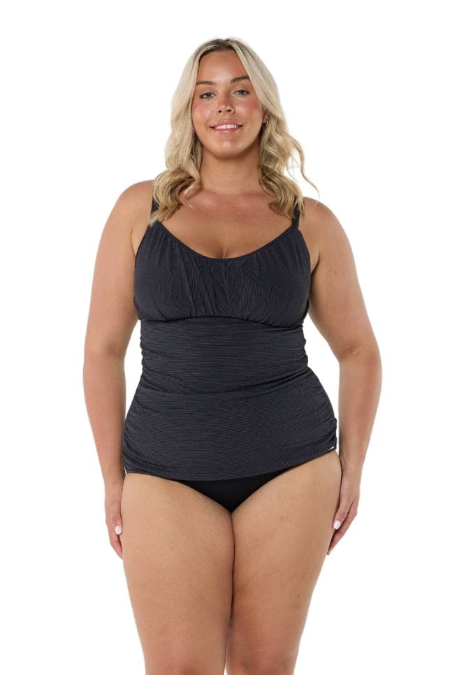 Blonde model wearing black honey comb underwire tankini