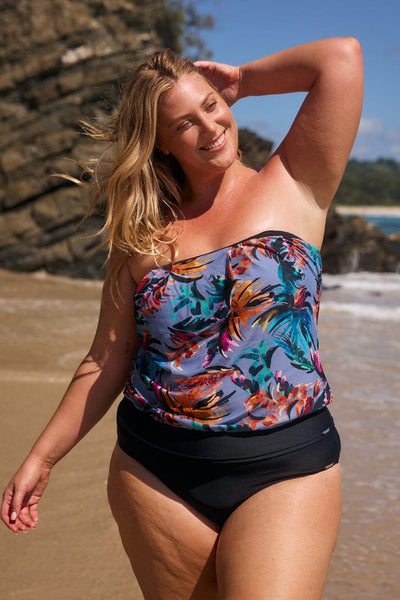 model wearing tropical print flouncy tankini