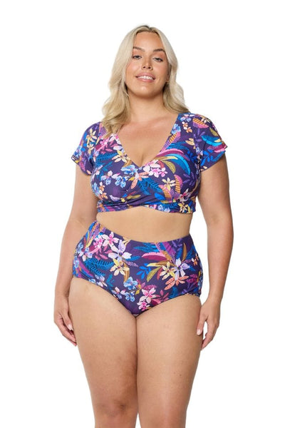 Front of curve model in studio wearing v neck bikini top with wrap tie detail