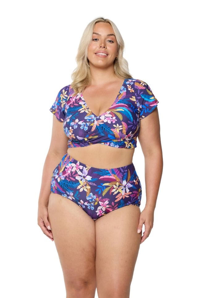 Front of curve model in studio wearing v neck bikini top with wrap tie detail