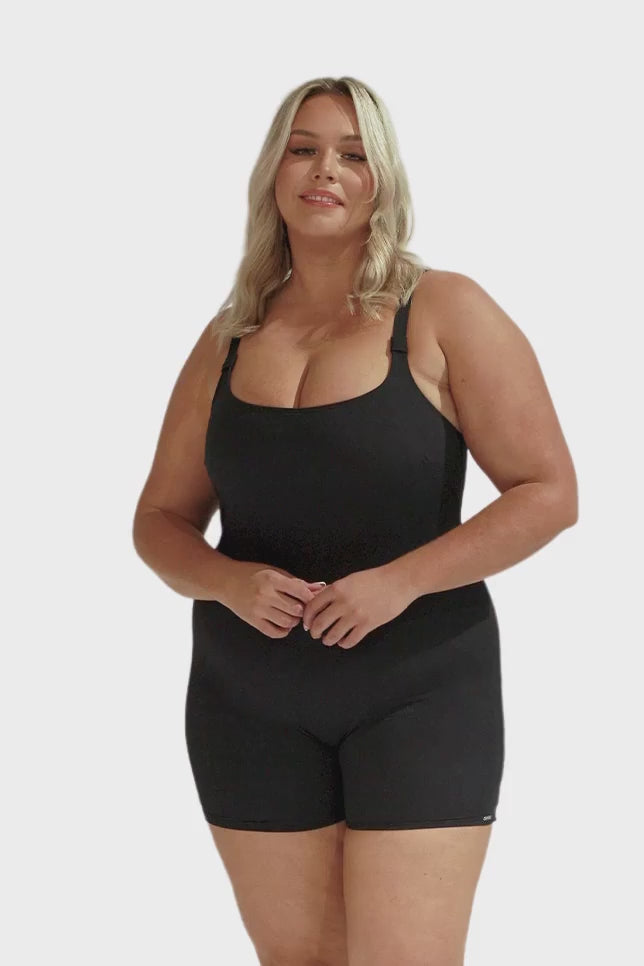 Video of plus size women in studio wearing black chlorine resistant one piece with boy leg