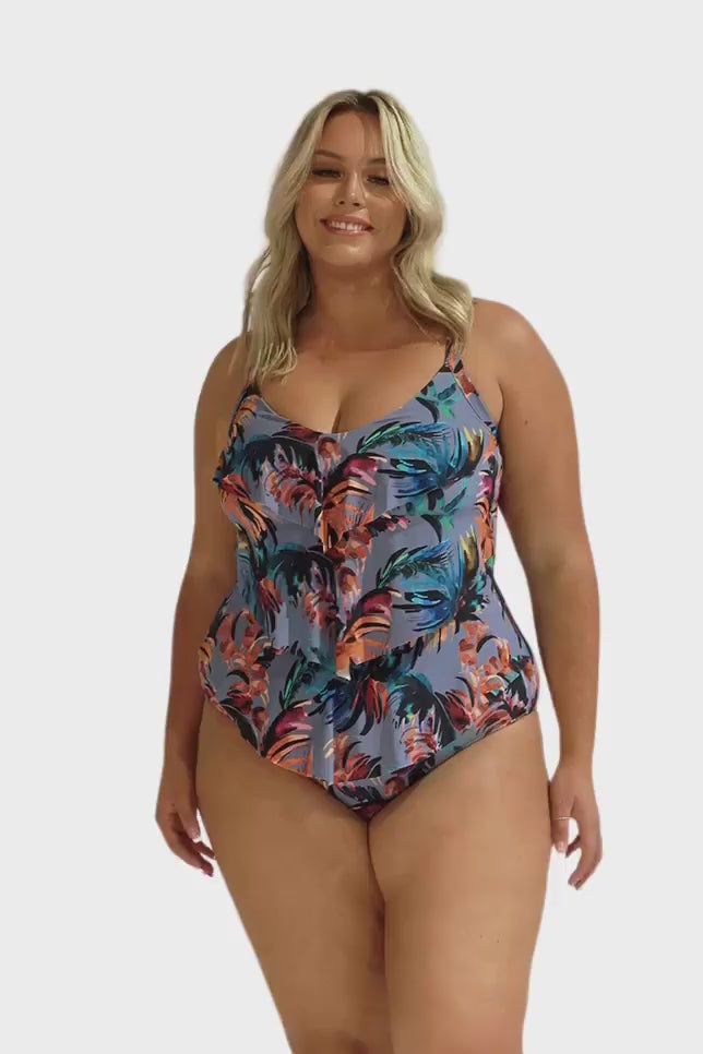 Video of model in studio wearing colourful ruffle one piece swimsuit for plus size women