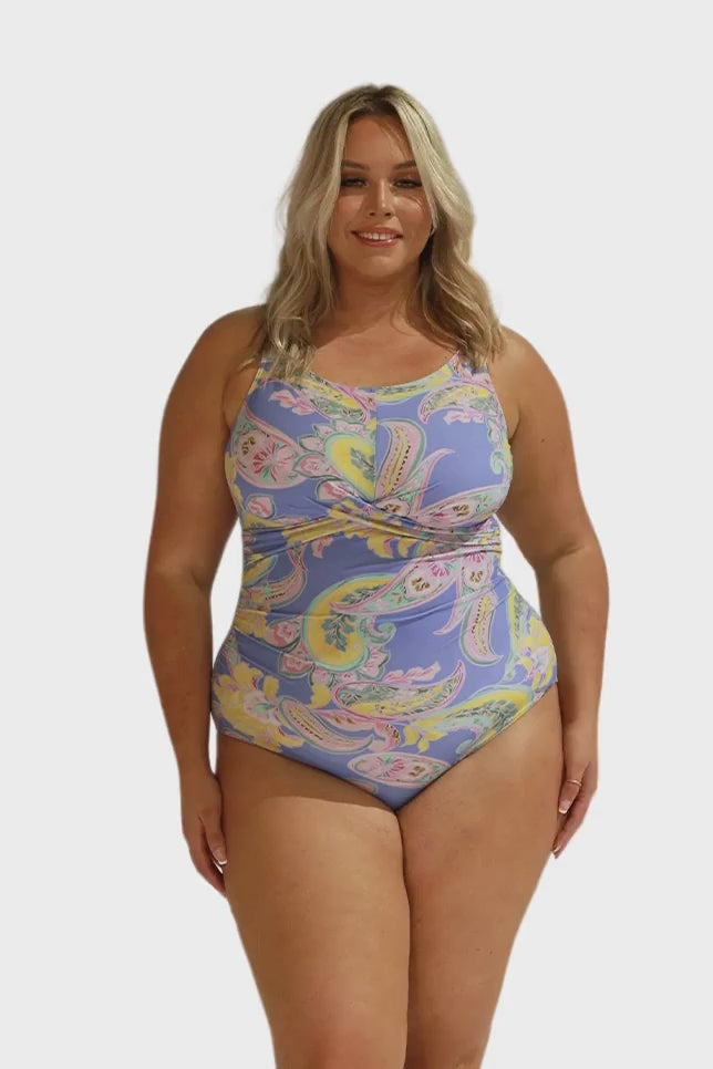 Video of plus size blonde lady wearing a high necked ruched one piece