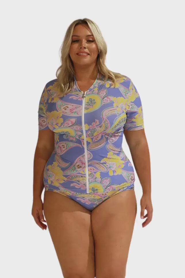 Video of blonde plus size model wearing paisley swim shirt with short sleeve