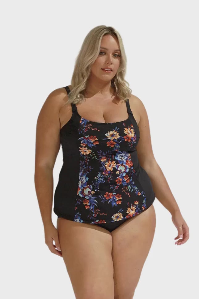 Video of blonde curve model in studio wearing black based floral print 