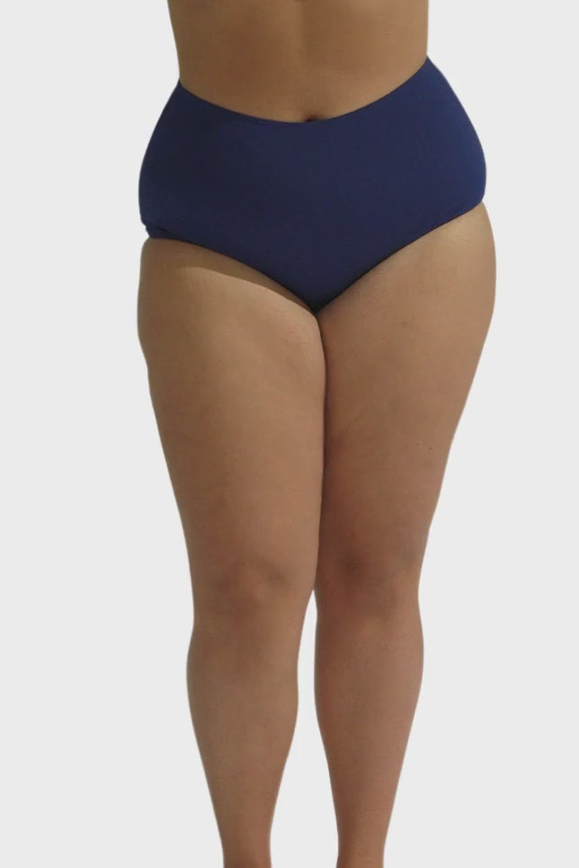 model wearing navy chlorine resistant swim bottoms