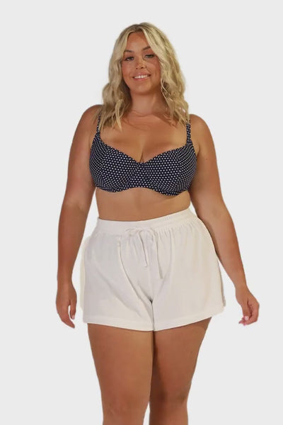 Video of plus size model wearing high waisted draw string short in terry towelling