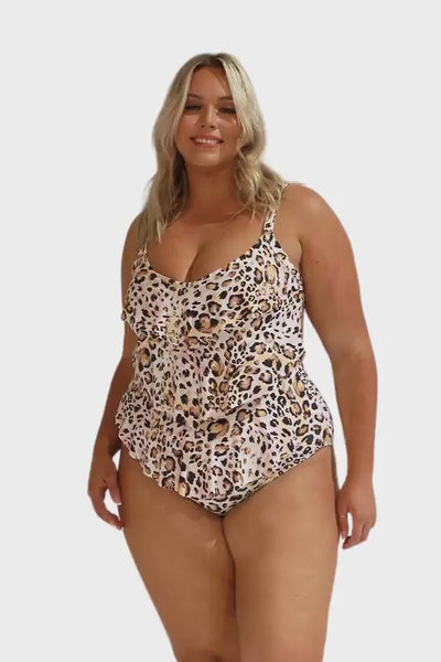 Video of model in studio wearing tiered ruffle one piece in leopard for curve women