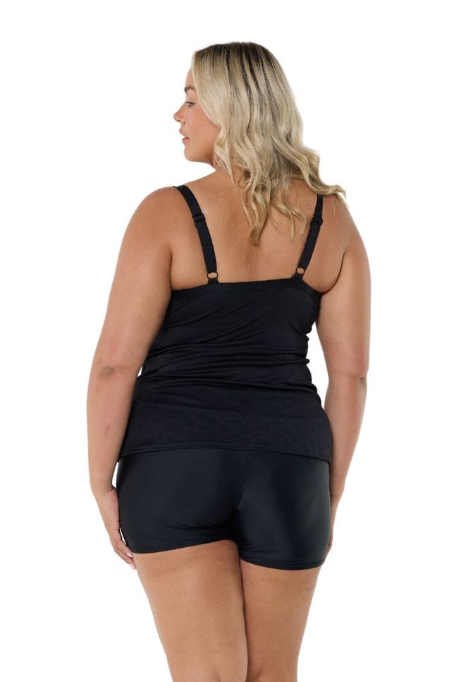 Blonde model showing back of black and white underwire tankini top